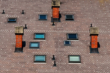 Roof tile pattern with chimneys, skylight windows, snow stoppers and lightning rods - obrazy, fototapety, plakaty