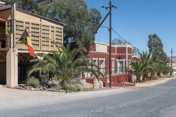 picturesque old red Judgenstyl building at desert village, Aus,  Namibia