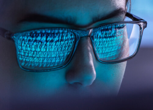 IT professional analyzing virus attacking computer