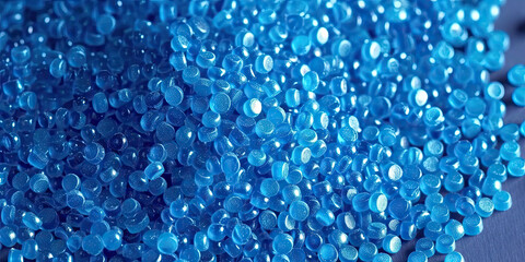  3d blue tiny plastic cylindrical grains , blue plastic polymer pellets,polymer for pipes, Plastic and polymer industry,blue PVC granulate.Microplastic products. - obrazy, fototapety, plakaty