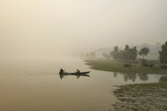 A fishing boat on the Naf River offers a glimpse into the daily life of local fishermen.