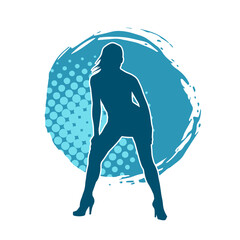 Silhouette of a slim female in dance pose. Silhouette of a woman dancing.