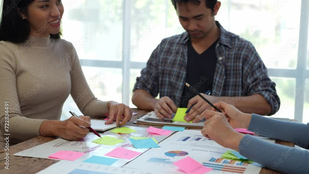 Poster group of asian creative team brainstorming and working together by computer notebook at creative off