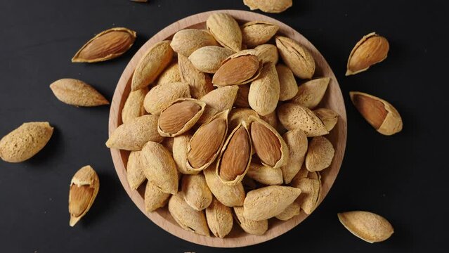 Closeup of almonds，organic badam on table.