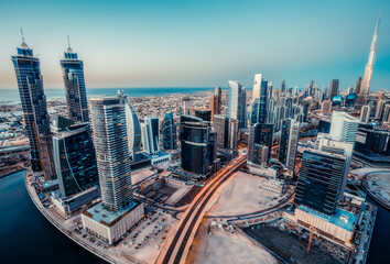 Scenic panoramic view of modern city architecture. Skyline of Dubai, UAE, with skyscrapers. Travel...