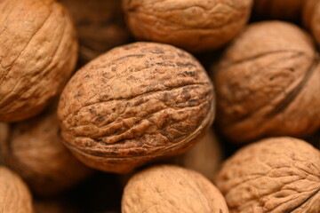 Top view of whole walnuts as background texture