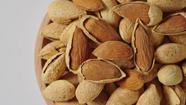 Closeup of almonds，organic badam on table.