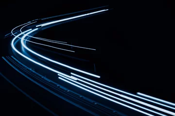 Cercles muraux Autoroute dans la nuit blue car lights at night. long exposure