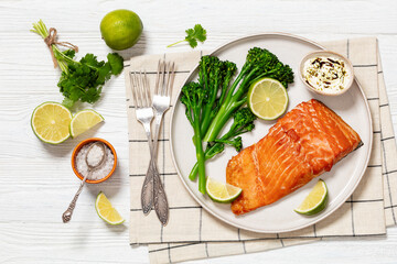 hot smoked salmon with cooked broccoli and lime