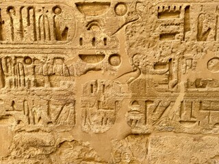egyptian ancient wall with hieroglyphs background 