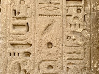 ancient egyptian bas relief, background with hieroglyphics 