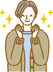 嬉しさで手を握りしめ笑顔になる女性