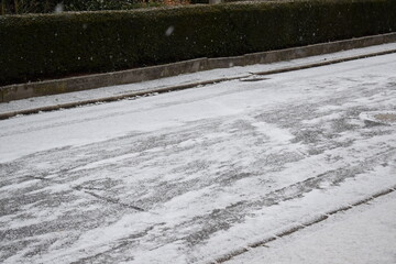 snow with tracks on the road