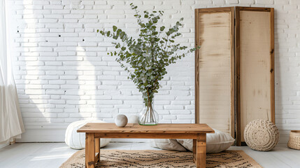 Fototapeta na wymiar Wooden coffee table with eucalyptus branches
