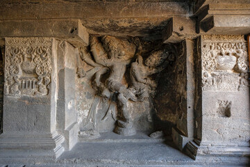 Ellora Caves are a rock-cut cave complex located in the Aurangabad District of Maharashtra, India.