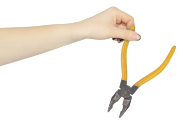 pliers in the hand, the hand holds out the pliers for working with electricity, isolated from the background	
