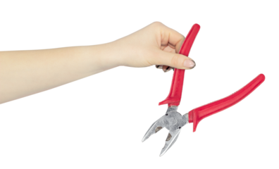 pliers in the hand, the hand holds out the pliers for working with electricity, isolated from the background	
