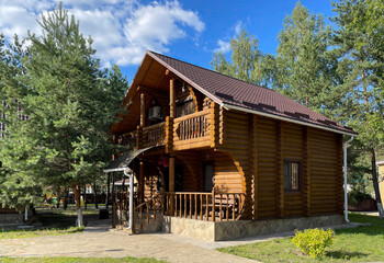 Fototapeta na wymiar Wooden log house for recreation with family