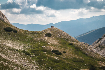 lonely cottage on a peak in austrian alpes