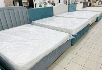 Luxury velour beds for sale at furniture store