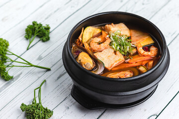 Korean seafood soup with mussels, prawnsand vegetables 