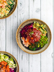 tuna poke bowl with crab, beans, cucumber, cabbage and wakame salad