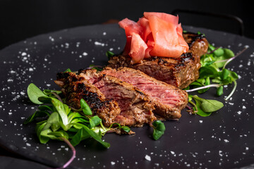 medium rare sliced asian style marinated rump steak 