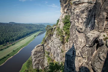 Papier Peint photo autocollant Le pont de la Bastei Bastei - a rock formation that is one of the greatest tourist attractions of the Saxon Switzerland National Park, in the Elbe Mountains in the eastern part of Germany