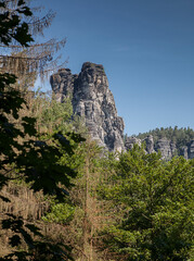 Bastei - a rock formation that is one of the greatest tourist attractions of the Saxon Switzerland National Park, in the Elbe Mountains in the eastern part of Germany - 722870617