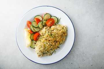 White fish fillet with garlic crumbs and rosemary - obrazy, fototapety, plakaty