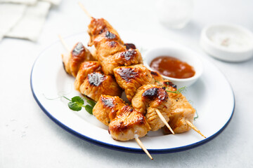 Homemade chicken skewers with mango chutney