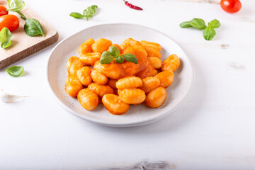 Potato gnocchi with fresh tomatoes sauce. Typical Italian food.