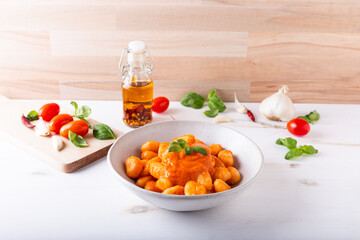 Potato gnocchi with fresh tomatoes sauce. Typical Italian food.