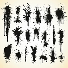a collection of black paint splatters