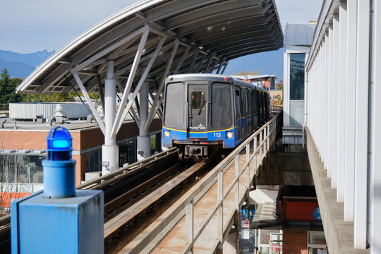 Vancouver, Canada. October 1, 2023. Skytrain entering the Commercial Broadway Station on the SkyTrain in Vancouver