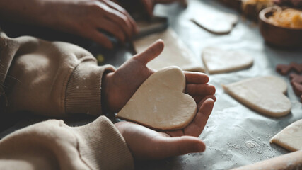 Mother's Day, mom and children in the kitchen making pizza, happy family concept