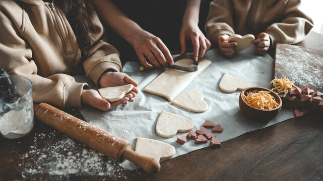 Mother's Day, Mom And Children In The Kitchen Making Pizza, Happy Family Concept