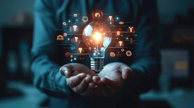 Businessman holding glowing lightbulb with learning icons for study knowledge to creative thinking idea and problem solving solution concept