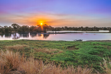 Fototapeta premium River flowing through Kruger National Park at sunrise, Kruger National Park, South Africa