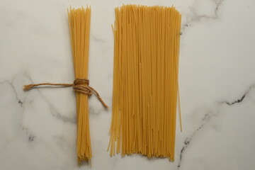 Spaghetti is a type of pasta that is long, thin and dense, resembling noodles. Spaghetti is a...