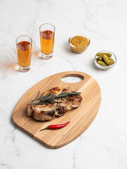 pork steak on a wooden board