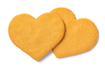 Pair of sweet cookies in heart shape isolated on white background close up