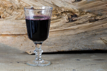 a glass of wine on the table