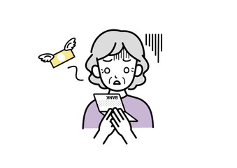 通帳を見て落ち込むシニア女性