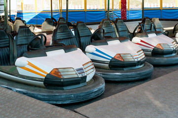 Old bumper cars of the dodgem in the funfair 
