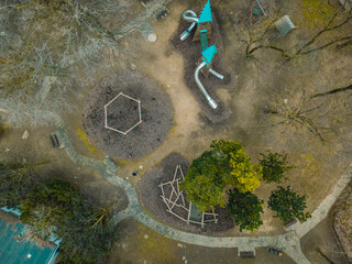 Drone view of a city park and playground in winter. January 20, 2024 Italia, Milano, San Donato Milanese