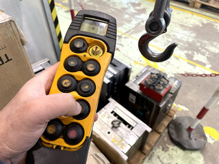 yellow remote control for overhead crane