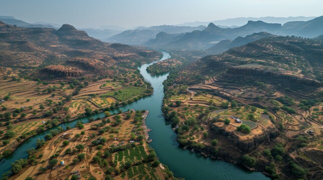 The meandering Krishna River valley cutting through the rugged Deccan Plateau of Maharashtra, India