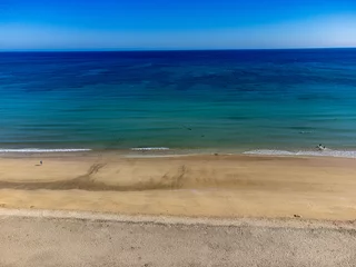 Photo sur Plexiglas Plage de Sotavento, Fuerteventura, Îles Canaries Aeriav view on sandy dunes, beach and Costa Calma, Fuerteventura, Canary islands, Spain in winter on sunset