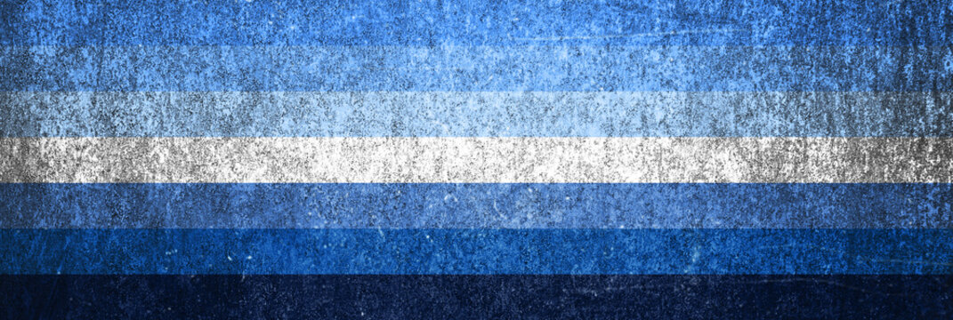 Gay men pride flag on metal surface. Gay men pride flag is one of the sexual minority of LGBT community - Powered by Adobe